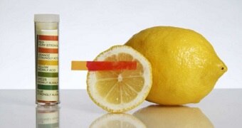 A litmus test showing lemon to be highly acidic.