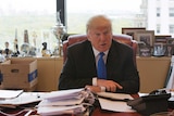 Republican presidential candidate Donald Trump speaks during an interview in his office at Trump Tower in New York.