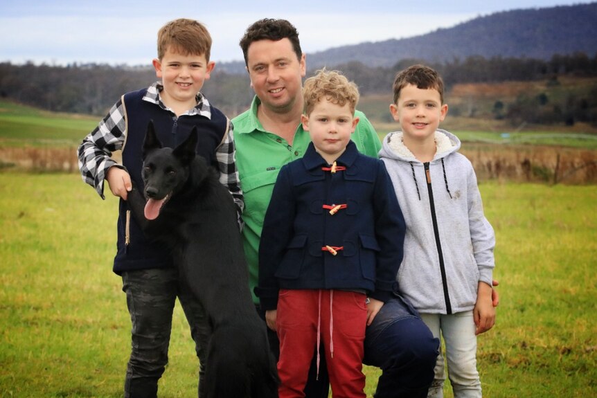 Sheep farmer Will Bignell with his sons