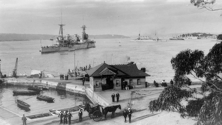 HMAS Australia I is pictured entering Sydney Harbour in 1913