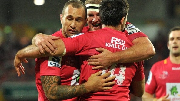 Rod Davies celebrates his try for the Reds