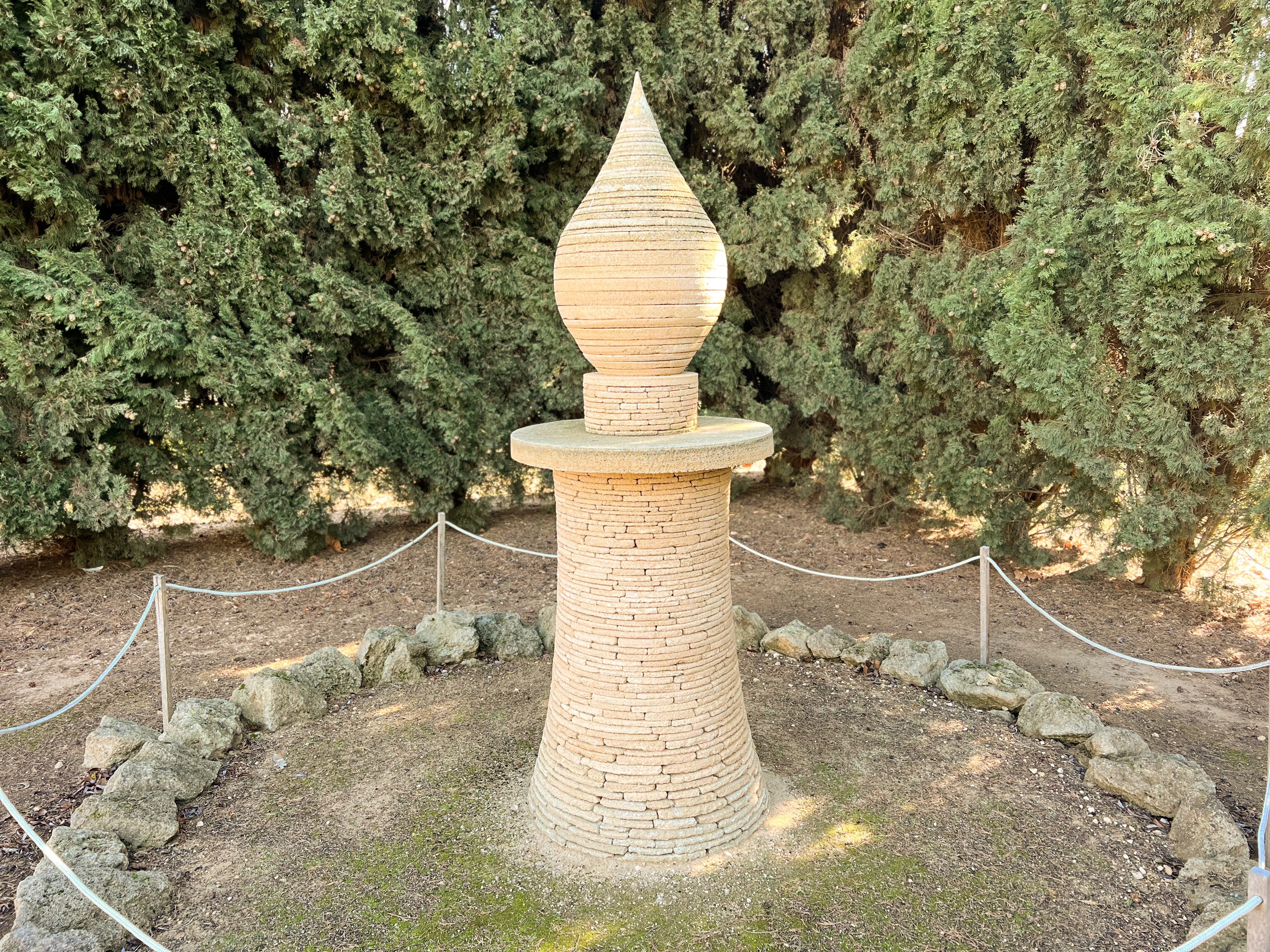 a drystone candle sculpture approx 1.5m tall