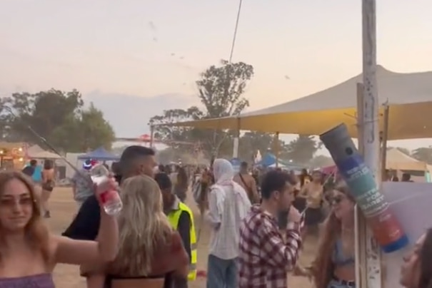 group of people dancing at dawn