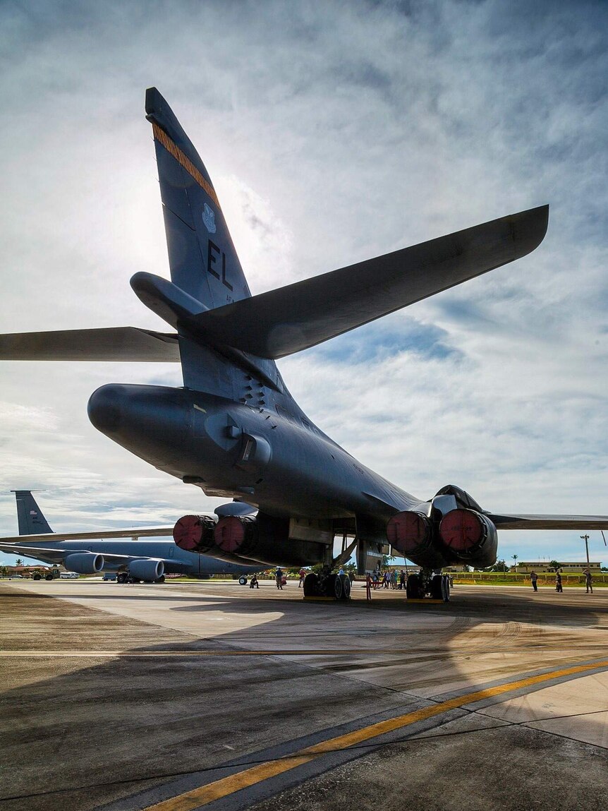 A rear view of a B1 bomber at an air base on Guam.