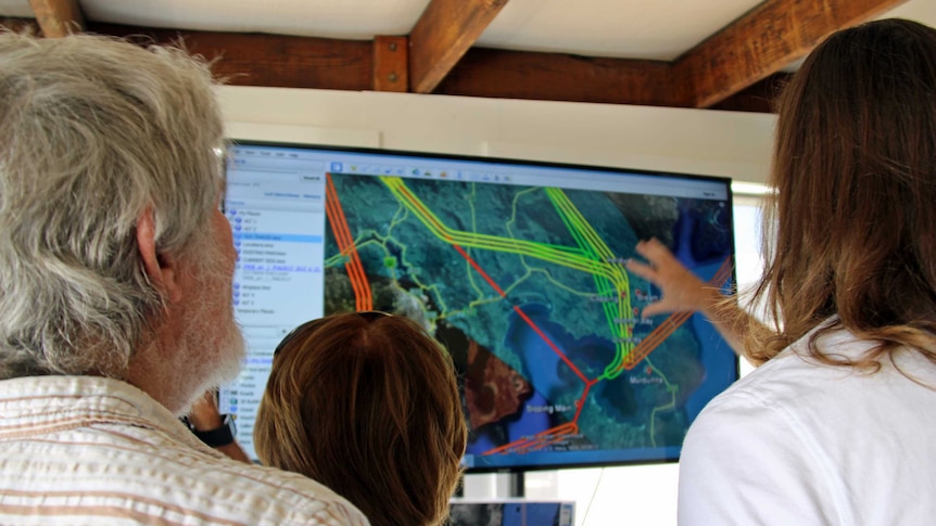 Tasman Peninsula residents looking at alternative flight path maps.