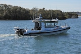 Marine rescue boat cruising in the water
