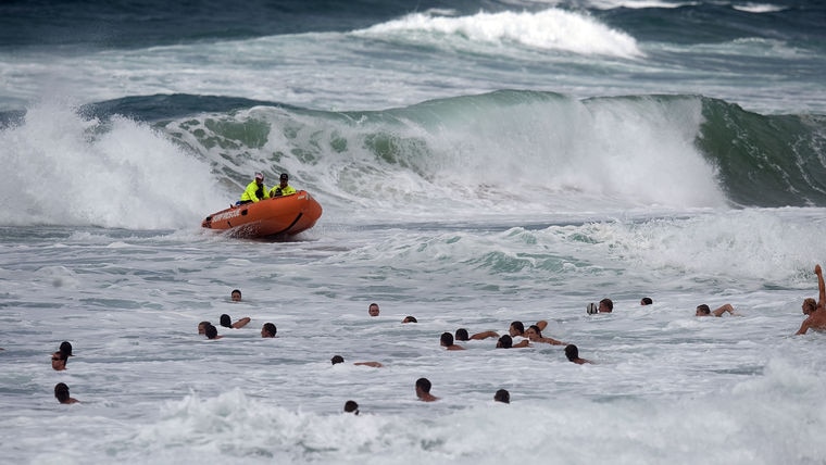 Far south coast swimmers are urged to take care in dangerous surf.