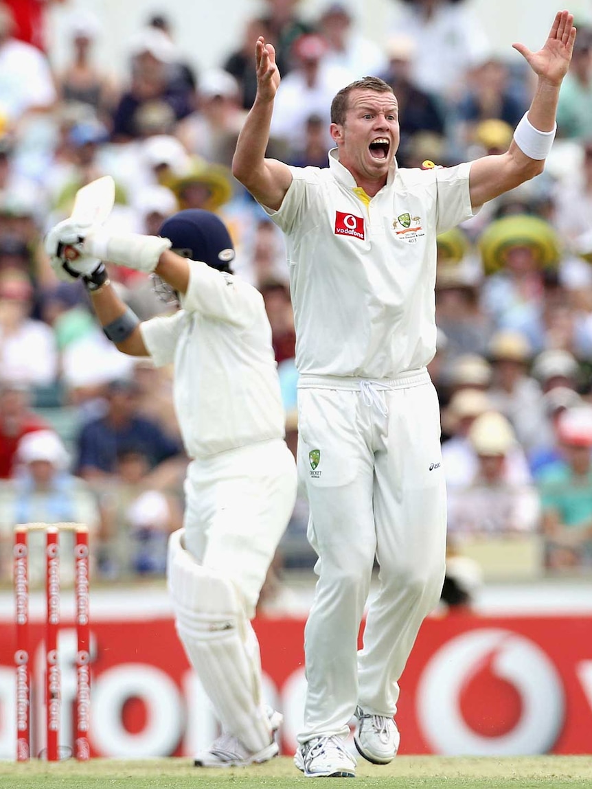 Siddle appeals for the wicket of Tendulkar