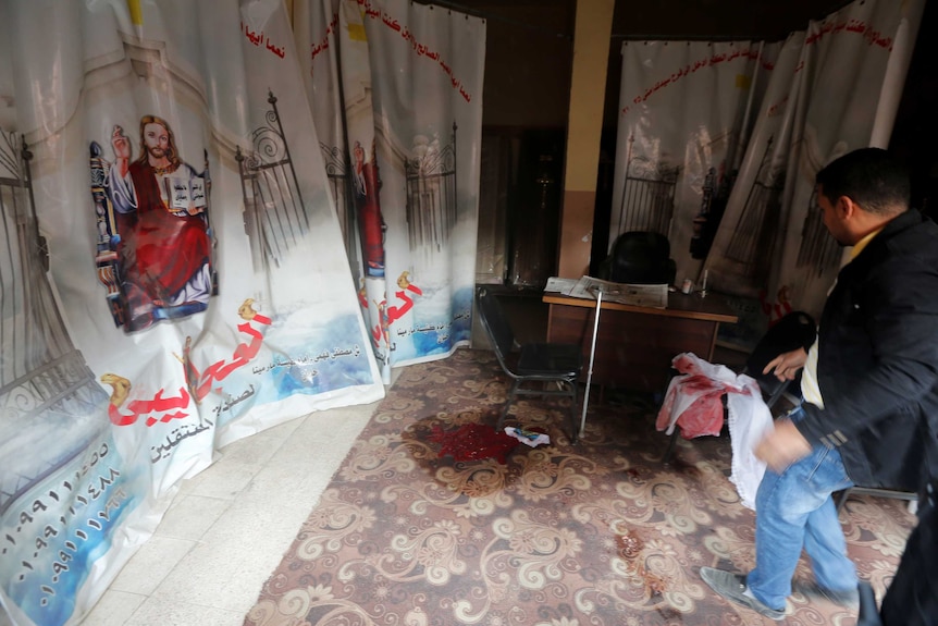 Blood stains on the ground for victims killed in the attack on a church in the Helwan district south of Cairo