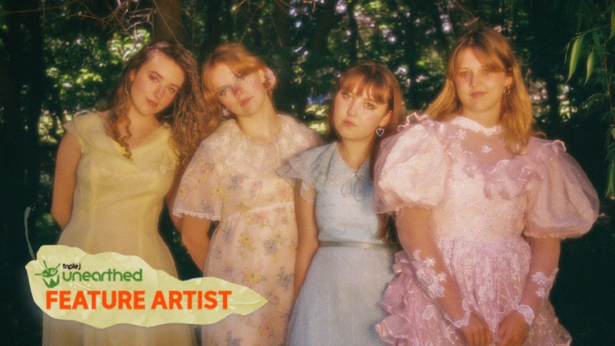 The four members of smol fish standing next to one another wearing vintage dresses with the Feature Artist logo.