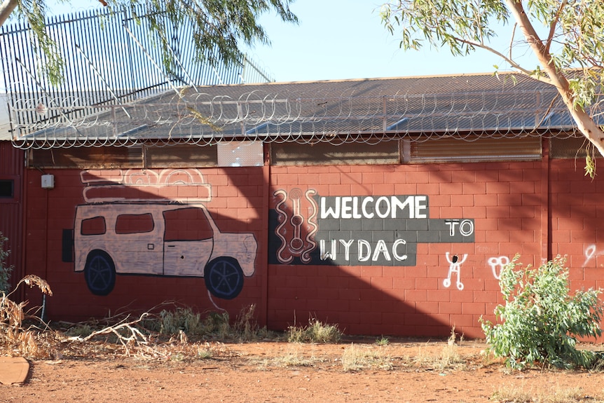 A building that says "welcome to WYDAC" on the side.