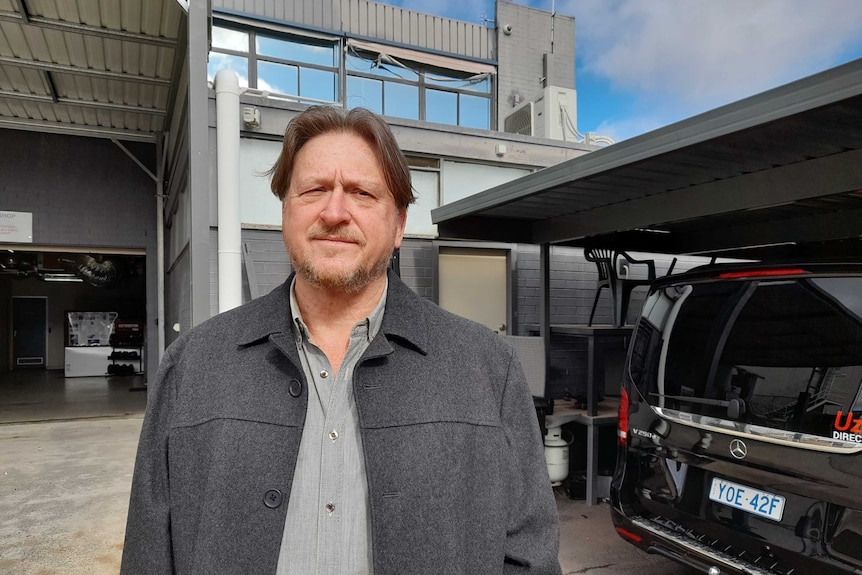 Man in transport company facility