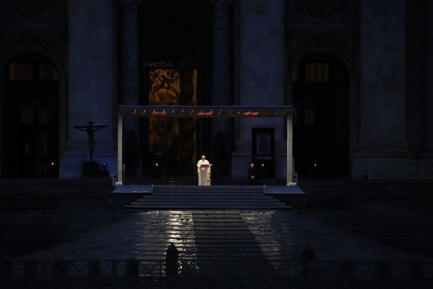 Pope Francis delivers a prayer to an empty St Peter's Square at the Vatican.
