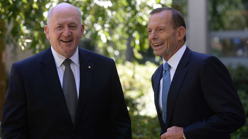 General Peter Cosgrove shares a laugh with Tony Abbott after being named Australia's 26th Governor-General.