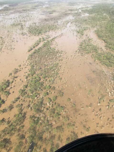 Aerial photo of floodwaters covering part of Strathmay Station, in Cape York.