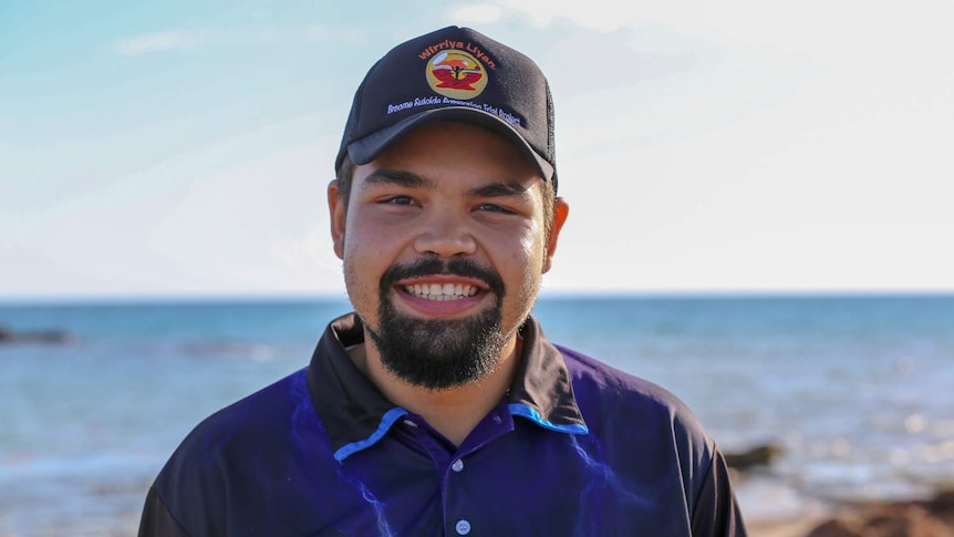 Empowered Youth Leader delegate Jacob Smith stands at Cable Beach, Broome.