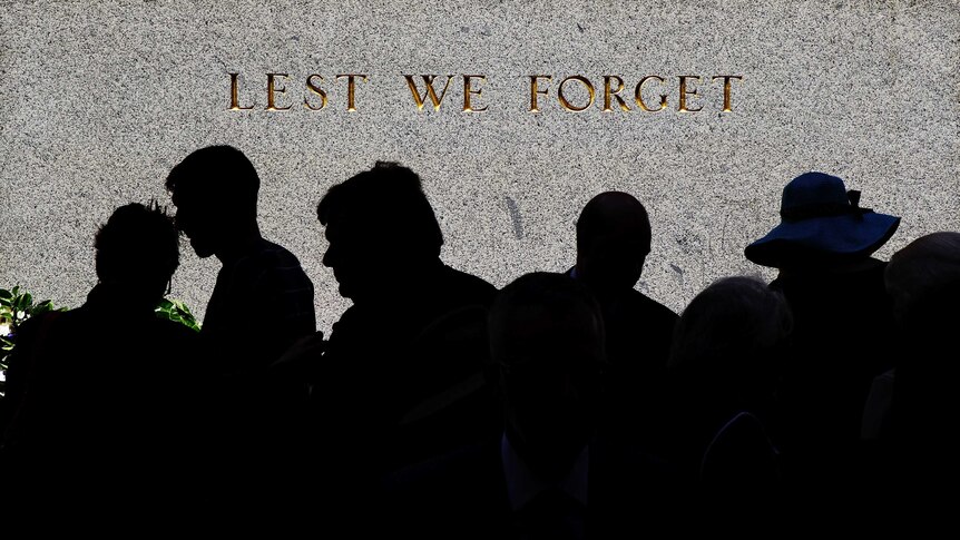 People gather around the Cenotaph at the Remembrance Day Service held at Martin Place on November 11, 2012.