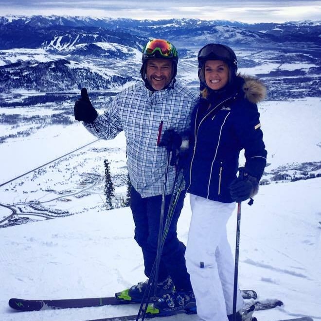 Australian Dave Hannagan and American woman Catherine Grimes posing on a ski slope
