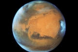 the planet Mars seen through NASA's Hubble Space Telescope