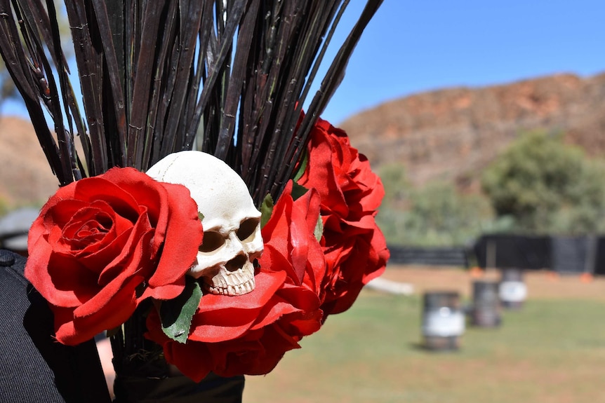 A skull and roses.