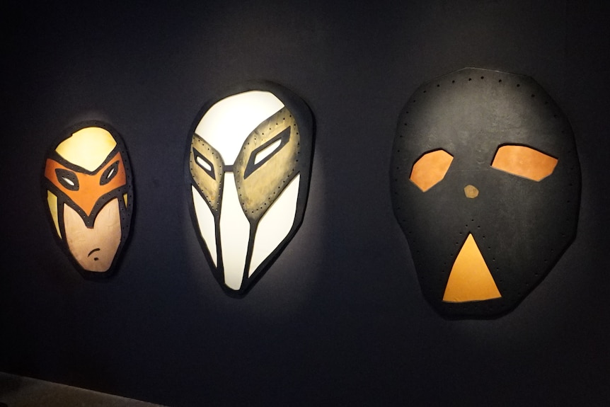 three superhero masks