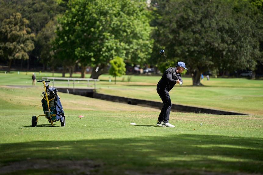 A golfer plays at the Royal Sydney Golf Course in Rose Bay