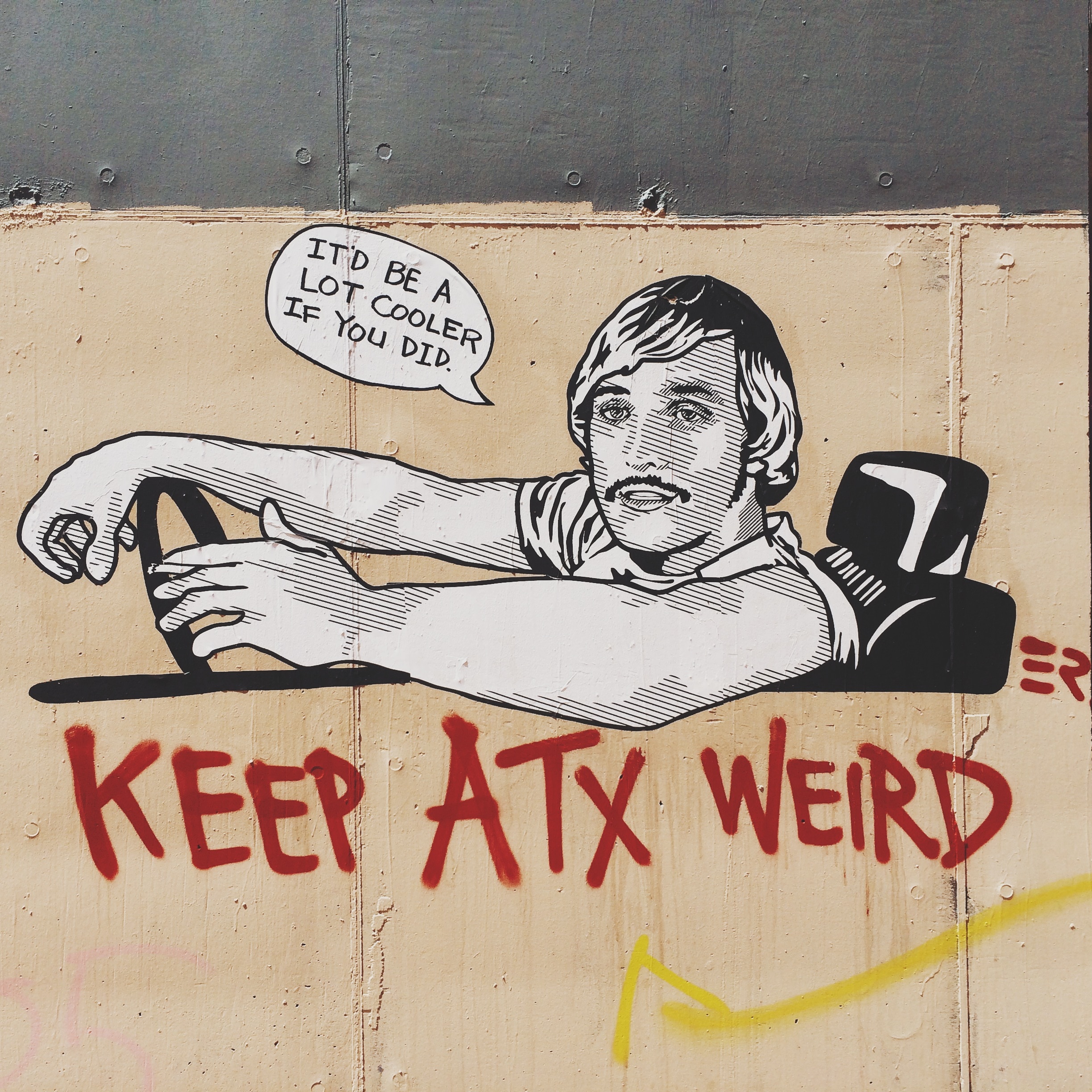 Street art on a wall, incorporating a cartoon of a man in a car and the words: "Keep ATX Weird".