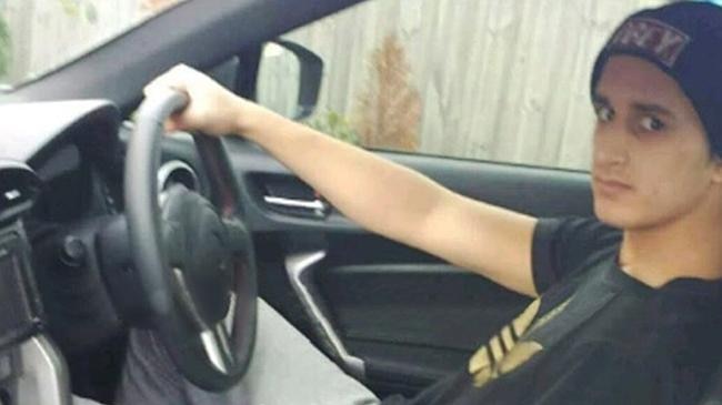 A photo of Numan Haider at the wheel of a car.