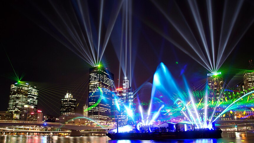 Lights and lasers fill the night sky at the City of Lights event during the Brisbane Festival.