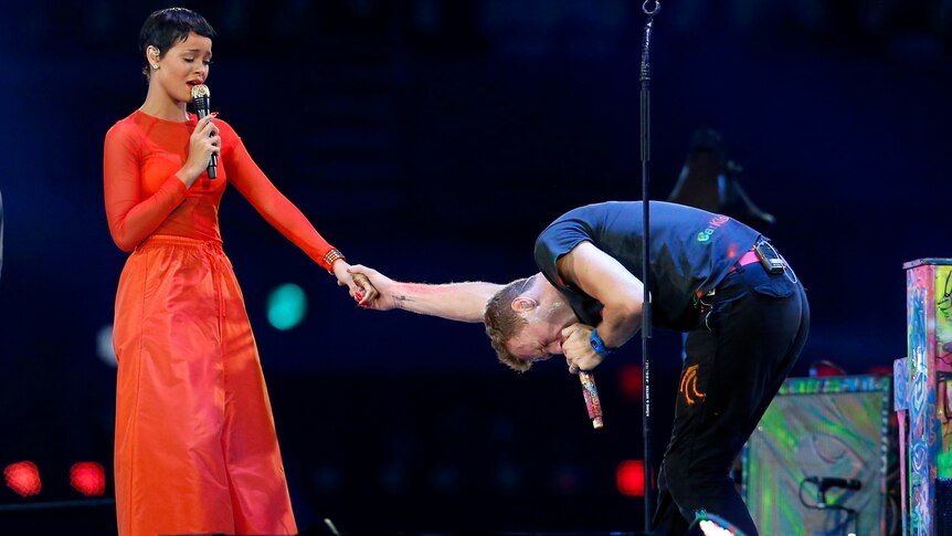 LtoR Rihanna and Chris Martin from Coldplay perform during the closing ceremony.