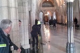 Guards at Canadian Parliament rush and kill gunman