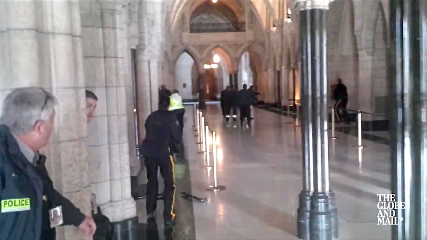 Guards at Canadian Parliament rush and kill gunman