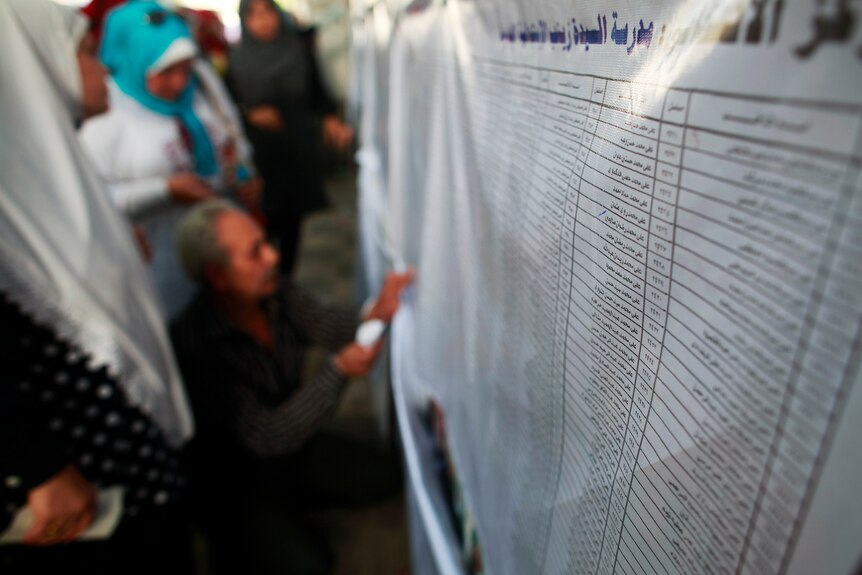 Egyptian voters search for their names