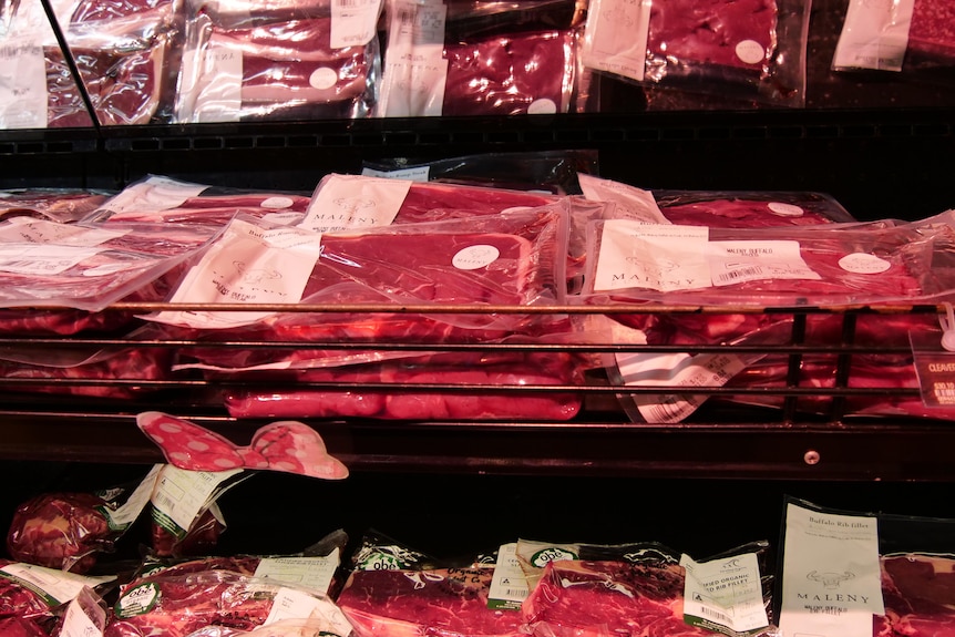 Meat in a grocery store cabinet