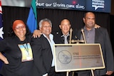 Singer Marlene Cummins, Mick Mundine, CEO Aboriginal Housing Company, Bidjigal elder Vic Simms and Allan Murray, Chairperson Metropolitan Land Council at the unveiling of the Pemulwuy plaque at the National Museum of Australia.