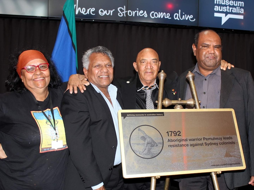 Singer Marlene Cummins, Mick Mundine, CEO Aboriginal Housing Company, Bidjigal elder Vic Simms and Allan Murray, Chairperson Metropolitan Land Council at the unveiling of the Pemulwuy plaque at the National Museum of Australia.