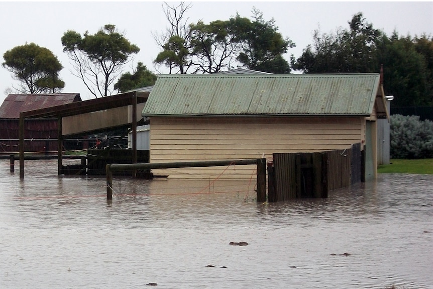 Flood waters surround a building at Welshpool, South Gippsland on July 21, 2011.