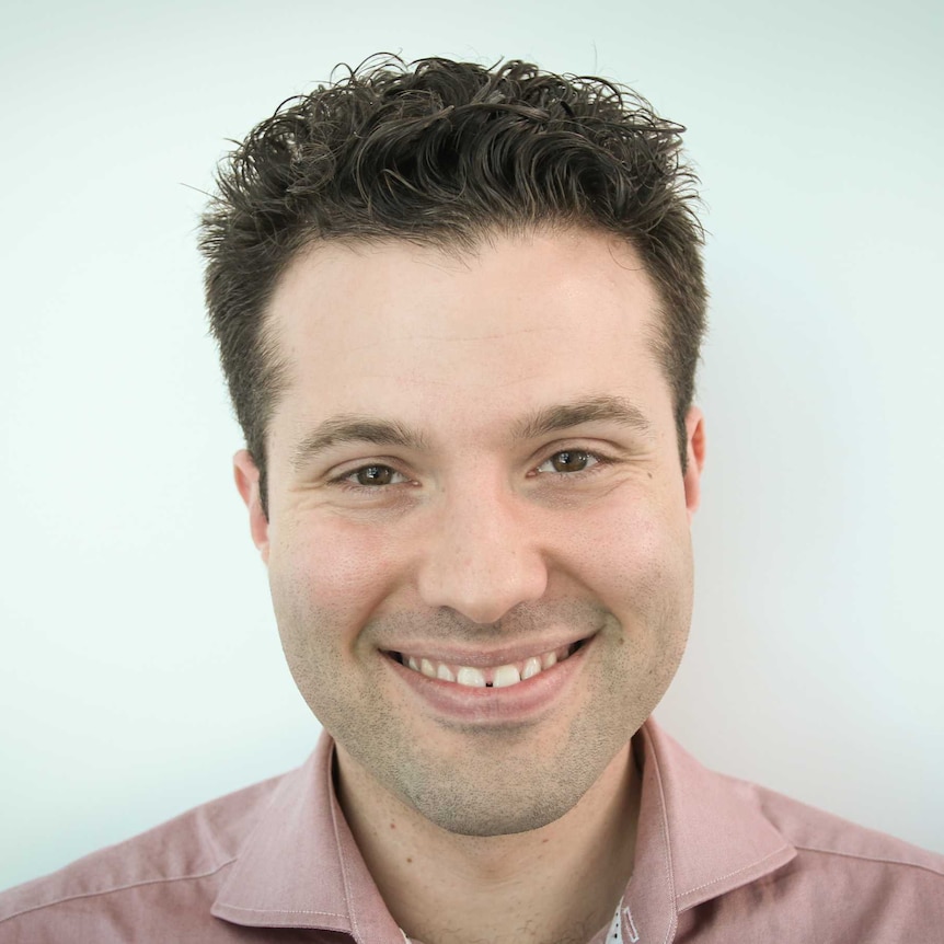 A photograph of ABC reporter Thomas Oriti, who is smiling