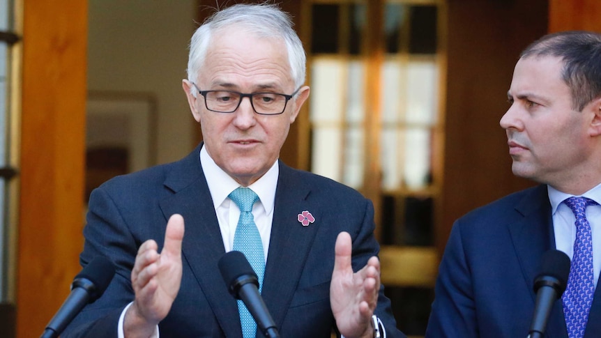 Prime Minister Malcolm Turnbull gestures during a press conference in Canberra