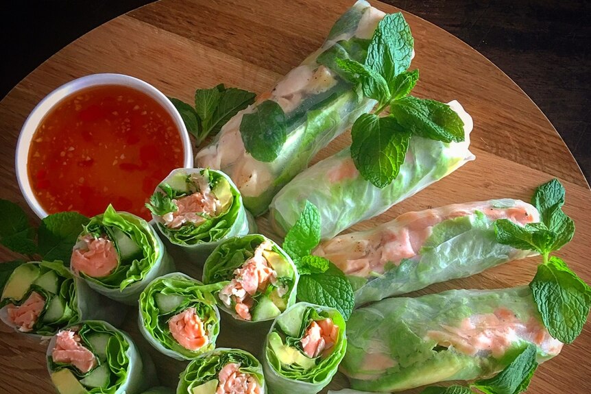 Vietnamese cold rolls with baked salmon and avocado.