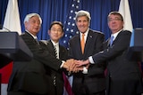 Japanese and US officials shake hands