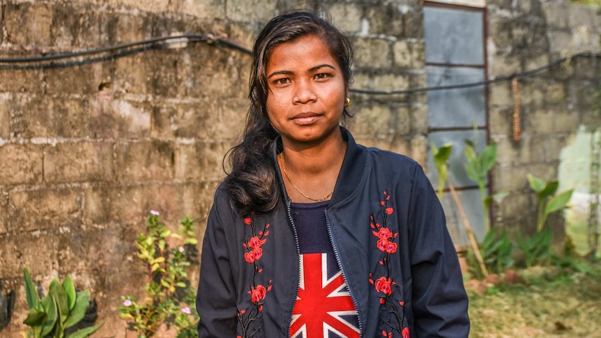 Maheshwori Nepali, a border guard with the NGO 3 Angels, looks at the camera.