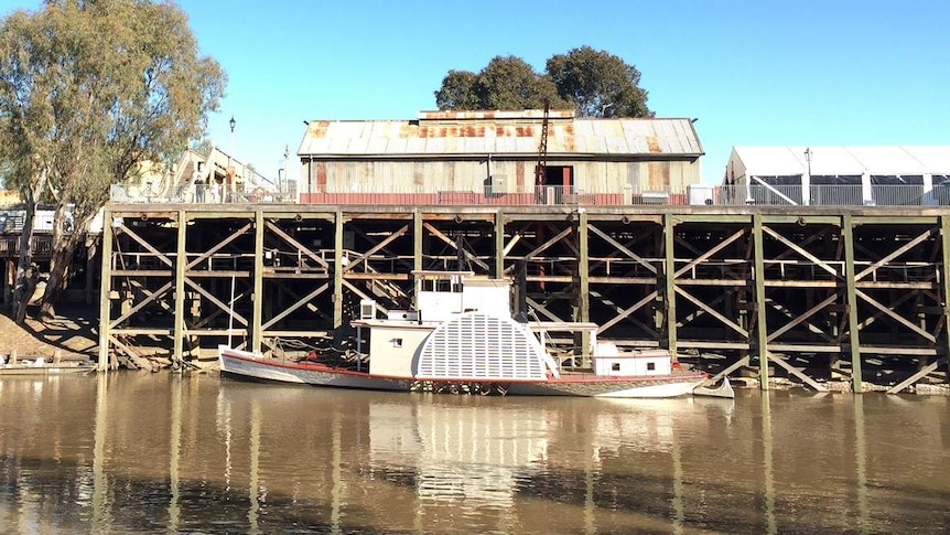 Photo taken from the Murray River looking back towards the Echuca wharf and a paddlesteamer.
