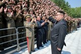 Kim Jong-un greets North Korean scientists