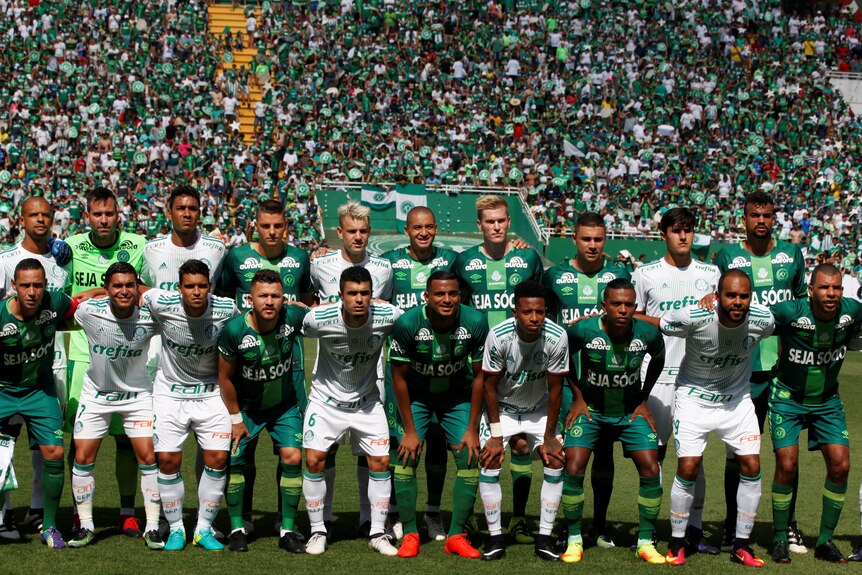 Chapecoense players line up before a charity match