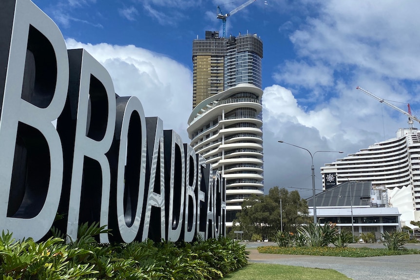 Broadbeach sign in the foreground of the Star Casino on the Gold Coast.