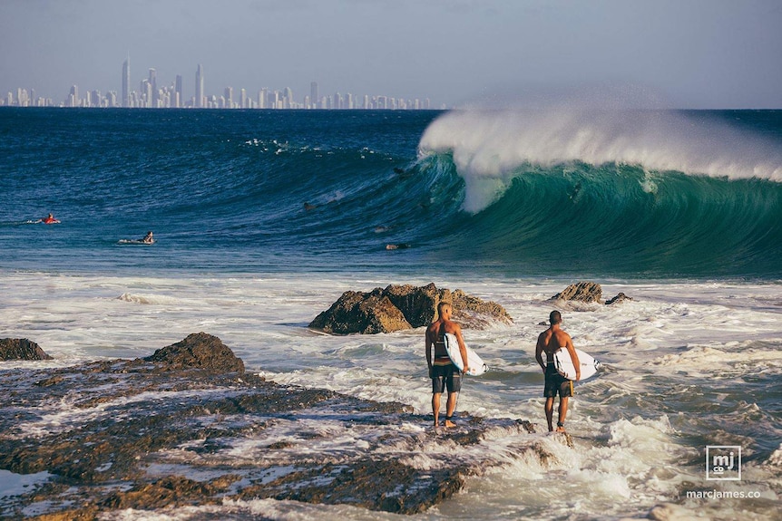 Mick Fanning going down to check the huge waves that had been pumping through Snapper Rocks in February.