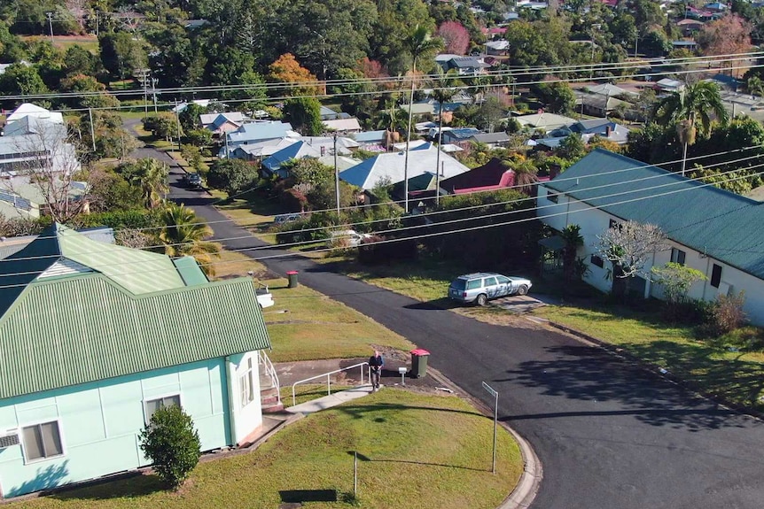 A street with houses on both sides.