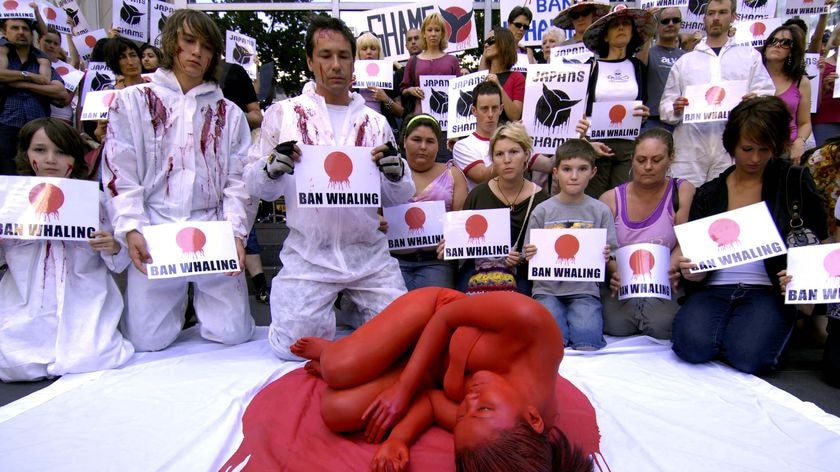 Anti-whaling protesters gather outside the Japanese consulate in Melbourne