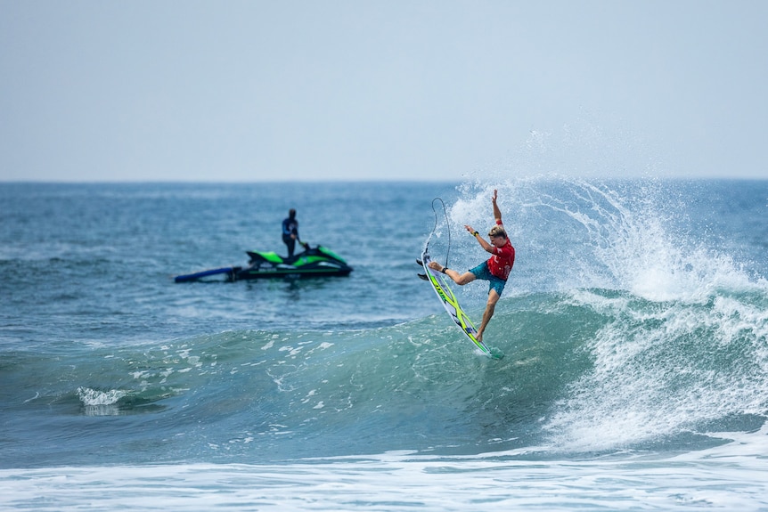 Surfer completing radical move